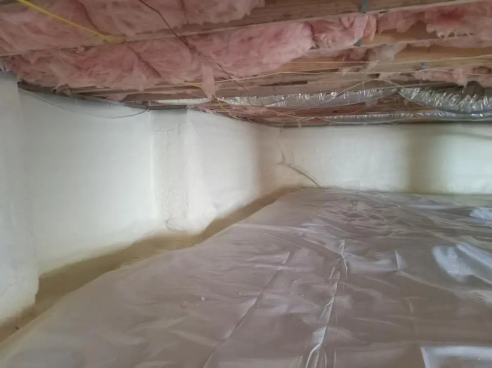 Crawl space encapsulation with closed-cell spray foam for Commercial Roof Restoration in Sodus